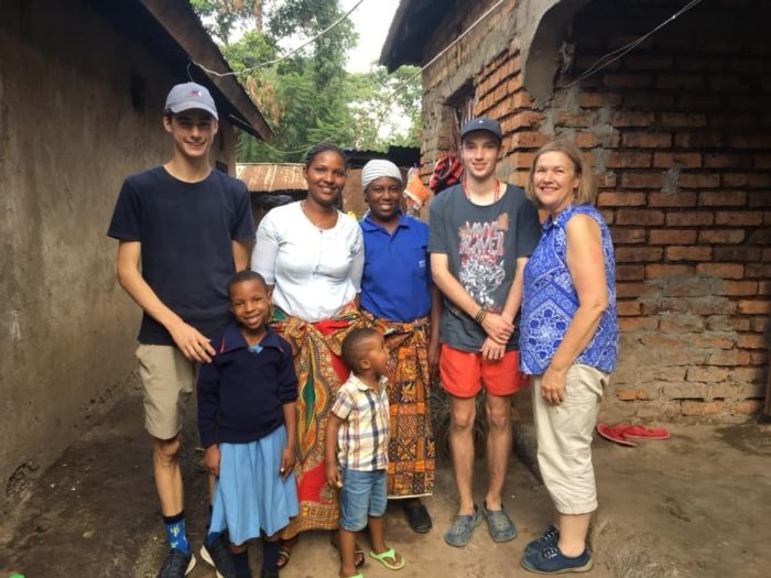 boys with family in Tanzania Immersion